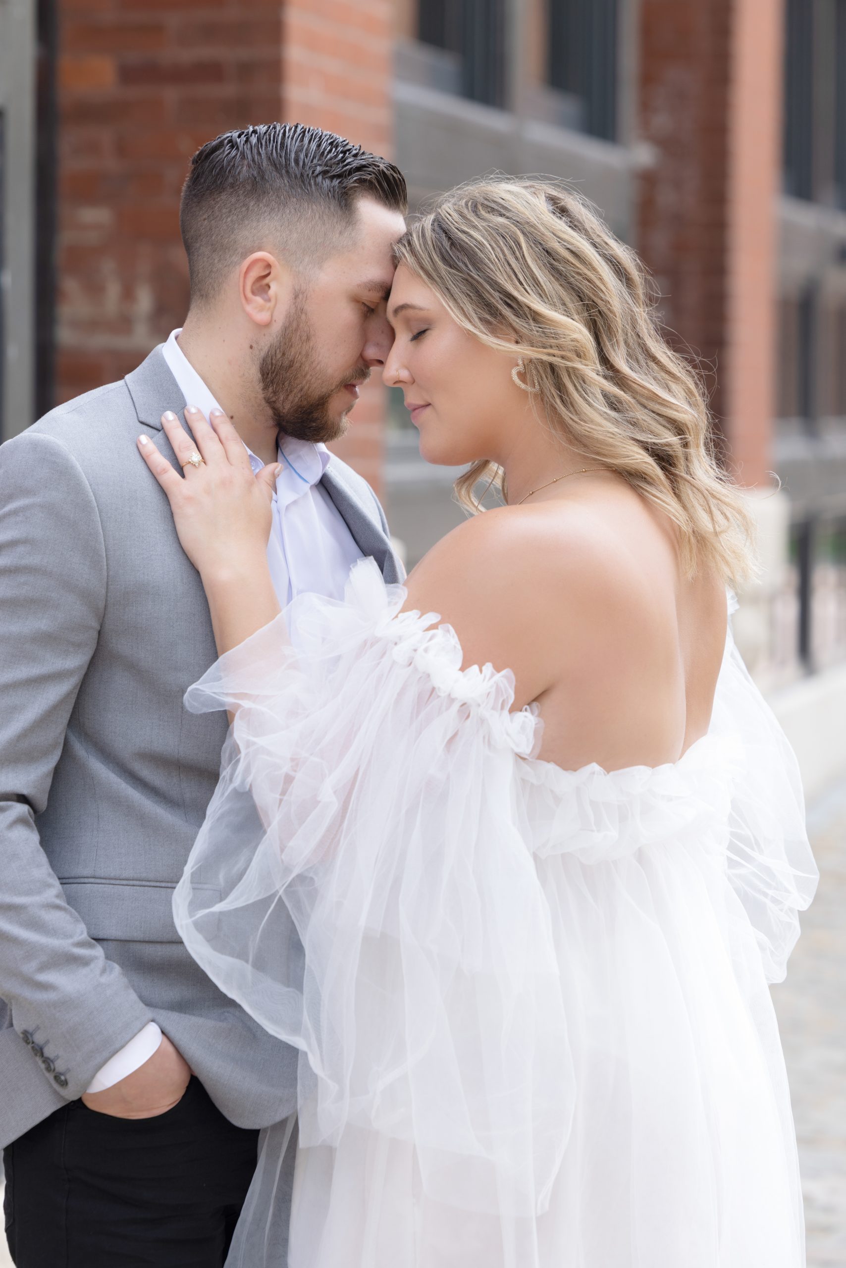 Engaged couple during an outdoor engagement portrait session.